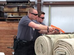 Two Lemoore Explorers take part in a simulated exercise testing their skills.